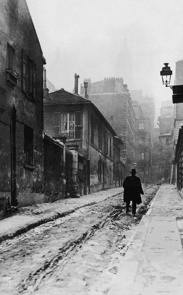 a solitary walker in montmartre, the artists quarter of paris (c. 1910).jpg