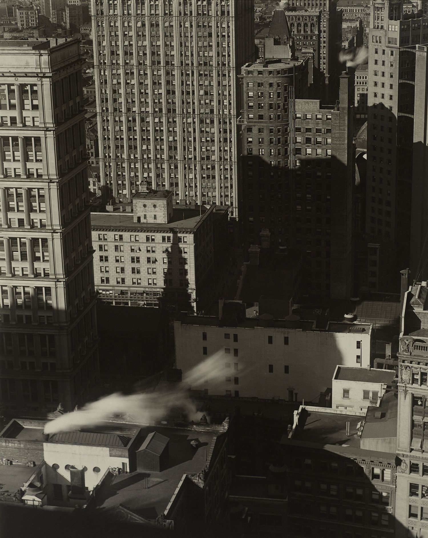 Charles Sheeler - New York, Buildings in Shadows and Smoke (Negative date 1920).jpg