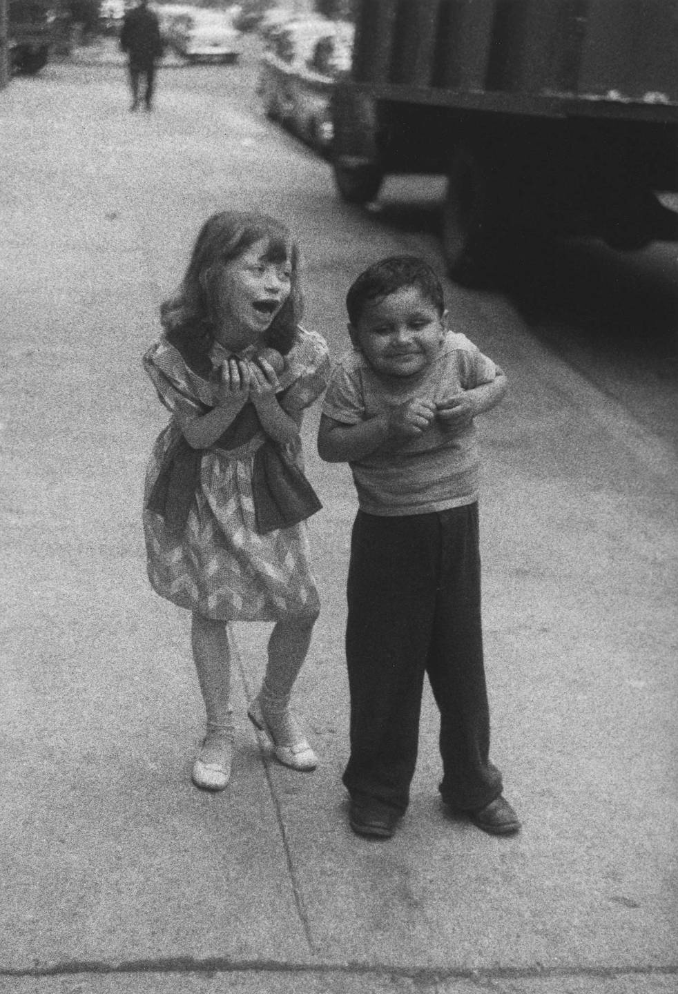 Diane Arbus - Child teasing another, N.Y.C., 1960.jpg