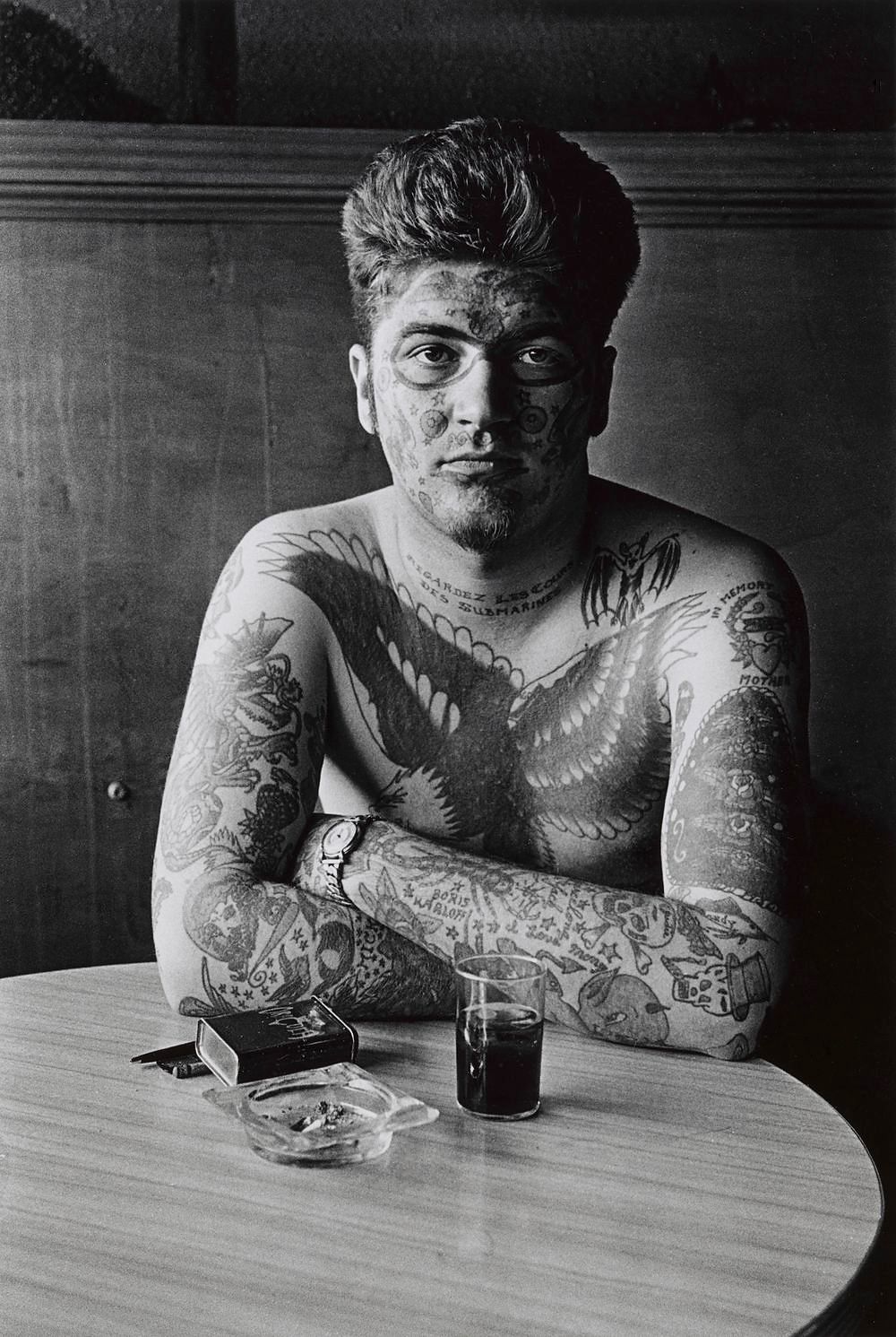 Diane Arbus - Jack Dracula at a bar, New London, Conn. 1961.jpg