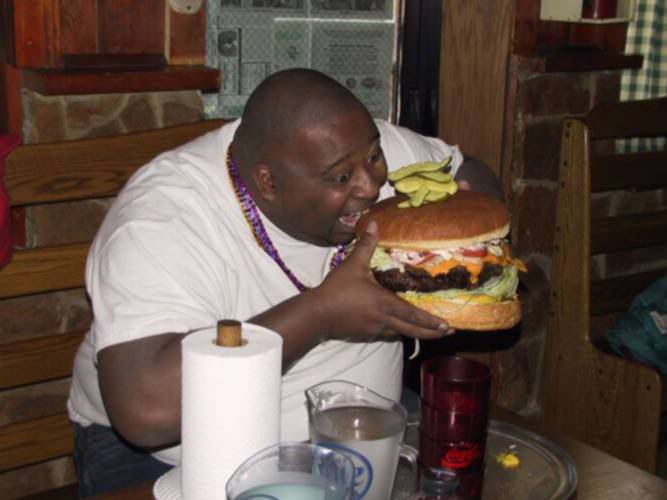 fatguyeatinggianthamburger.jpg~original.jpg