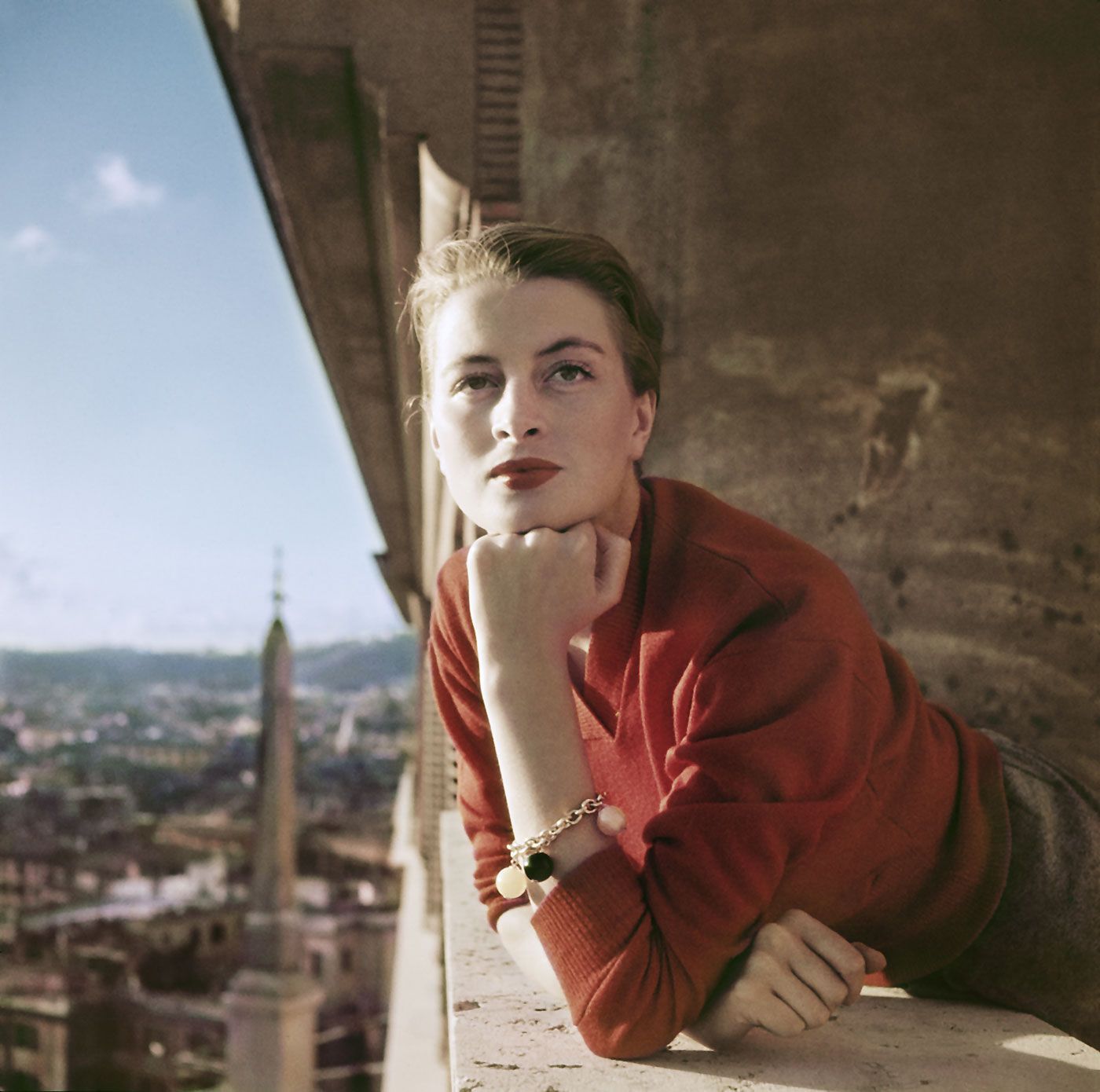 Robert Capa-Capucine, French model and actress, on a balcony, Rome, Italy August 1951.jpg