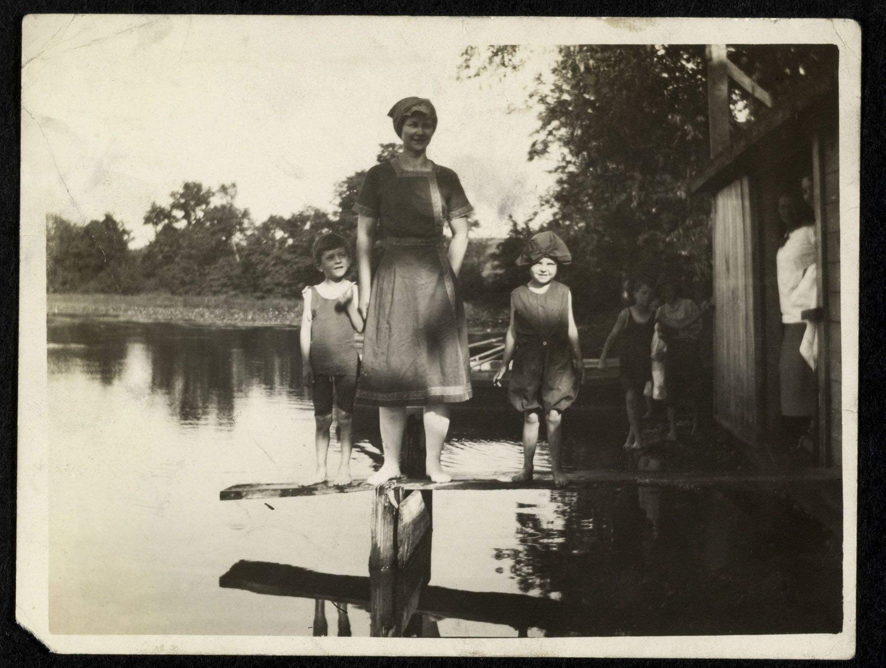 Unknown maker (American)-Group at pond(c. 1910s).jpg